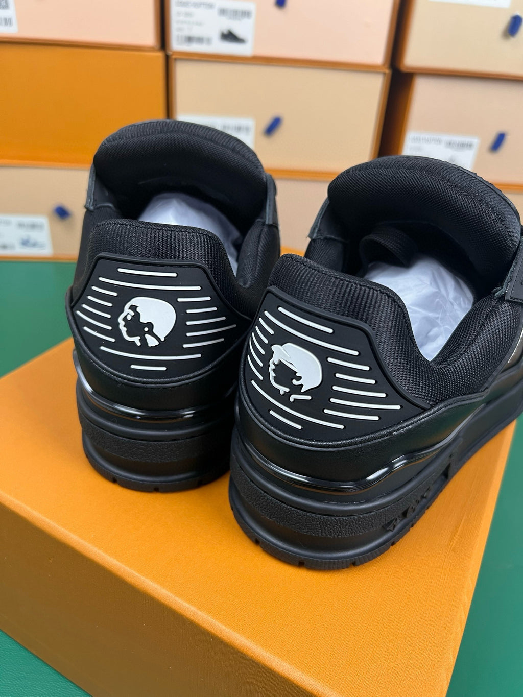 “LV” black trainers