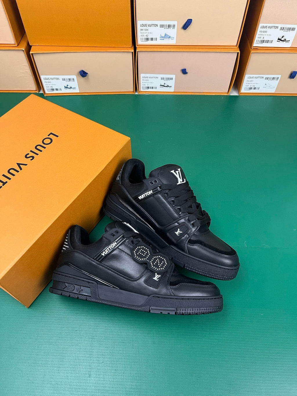 “LV” black trainers